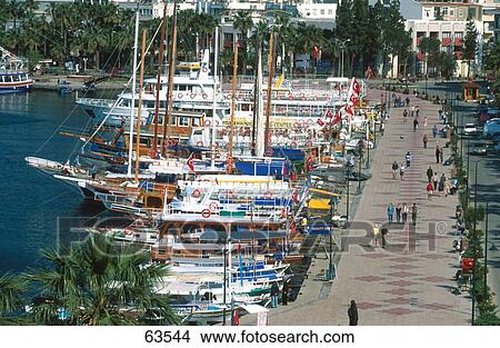 Picture - Sailboats moored at harbor, Turkey . Fotosearch
