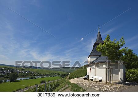 Saint Lawrence Chapel at the Moselle riverside near Trittenheim, Rhineland-Palatinate, Germany View Large Photo Image Stock Photo - Saint Lawrence Chapel at the Moselle riverside near Trittenheim, Rhineland-Palatinate, Germany . Fotosearch