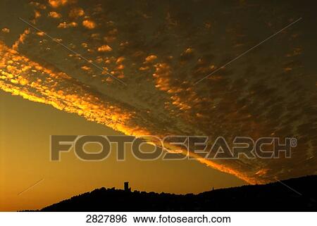 Silhouette of castle on hill at sunset, Marburg-Biedenkopf, Hesse, Germany View Large Photo Image Stock Photograph - Silhouette of castle on hill at sunset, Marburg-Biedenkopf, Hesse, Germany . Fotosearch