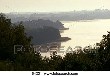 Silhouette of cliffs at the coast, Carwitzer See Lake, Mecklenburg-Western Pomerania, Germany View Large Photo Image Stock Image - Silhouette of cliffs at the coast, Carwitzer See Lake, Mecklenburg-Western Pomerania, Germany . Fotosearch