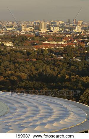 Soccer stadium with city in background, Olympic Stadium, Berlin, Germany View Large Photo Image Stock Photo - Soccer stadium with city in background, Olympic Stadium, Berlin, Germany . Fotosearch