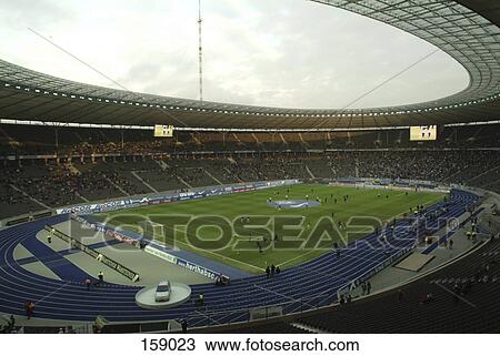 Spectators in soccer stadium, Olympic Stadium, Berlin, Germany View Large Photo Image Stock Image - Spectators in soccer stadium, Olympic Stadium, Berlin, Germany . Fotosearch