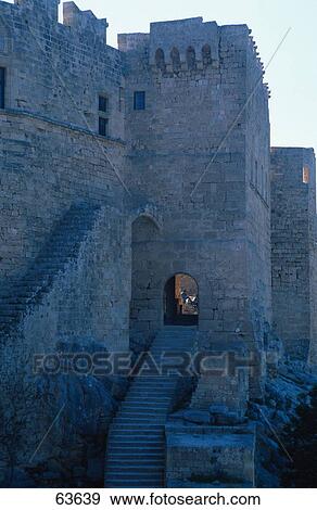 Stairs leading to archway entrance of castle, Rhodes, Dodecanese Islands, Greece View Large Photo Image Stock Photo - Stairs leading to archway entrance of castle, Rhodes, Dodecanese Islands, Greece . Fotosearch