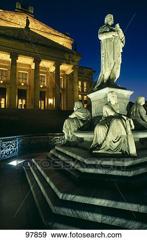 Stock Photo - Statues in front of theater, Schauspielhaus, Berlin, Germany . Fotosearch