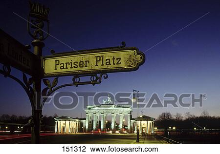 Street name signboard with archway lit up in background, Brandenburg Gate, Pariser Platz, Berlin, Germany View Large Photo Image Stock Image - Street name signboard with archway lit up in background, Brandenburg Gate, Pariser Platz, Berlin, Germany . Fotosearch