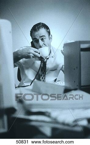 Stressed man in office View Large Photo Image Stock Image - Stressed man in office . Fotosearch