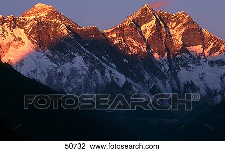 Stock Image - Sunlight on mountain peaks, Lhotse, Mt Everest, Himalayas, Nepal . Fotosearch