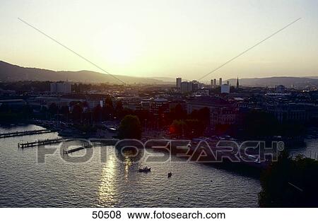 Sunset over mountain, Zurich, Switzerland View Large Photo Image Stock Photo - Sunset over mountain, Zurich, Switzerland . Fotosearch