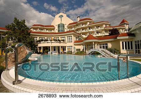 Swimming pool in front of hotel, Bad Tatzmannsdorf, Oberwart, Burgenland, Austria View Large Photo Image Stock Image - Swimming pool in front of hotel, Bad Tatzmannsdorf, Oberwart, Burgenland, Austria . Fotosearch