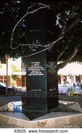 Stock Photography - Text written on memorial plaque on tree trunk, Rhodes, Dodecanese Islands, Greece . Fotosearch