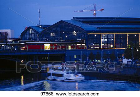 Tour boat in river near railway station, River Spree, Friedrichstrasse Railway Station, Berlin, Germany View Large Photo Image Stock Photograph - Tour boat in river near railway station, River Spree, Friedrichstrasse Railway Station, Berlin, Germany . Fotosearch