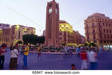 Tourist around bell tower in city, Beirut View Large Photo Image Stock Photo - Tourist around bell tower in city, Beirut . Fotosearch