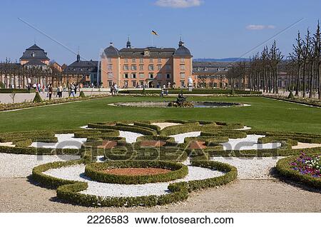 Tourists at formal gardens of palace, Schwetzingen Castle, Baden-Wuerttemberg, Germany View Large Photo Image Stock Image - Tourists at formal gardens of palace, Schwetzingen Castle, Baden-Wuerttemberg, Germany . Fotosearch