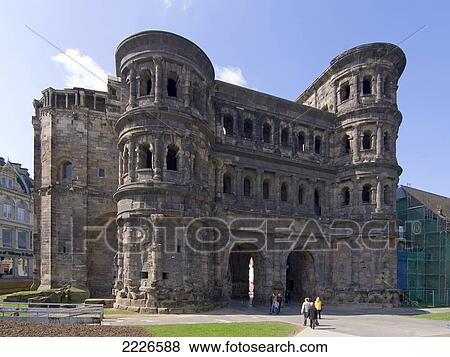 Tourists in front of ancient gate, Porta Nigra, Trier, Germany View Large Photo Image Stock Photo - Tourists in front of ancient gate, Porta Nigra, Trier, Germany . Fotosearch