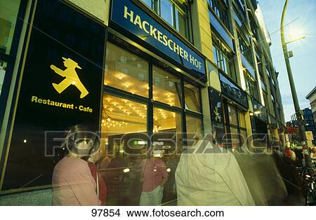 Tourists in front of restaurant, Hackesche Hoefe, Berlin, Germany View Large Photo Image Picture - Tourists in front of restaurant, Hackesche Hoefe, Berlin, Germany . Fotosearch