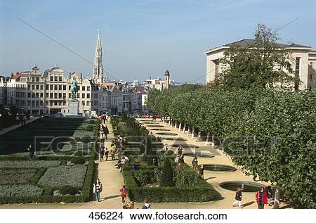 Tourists in garden with buildings in city, Brussels, Belgium View Large Photo Image Picture - Tourists in garden with buildings in city, Brussels, Belgium . Fotosearch