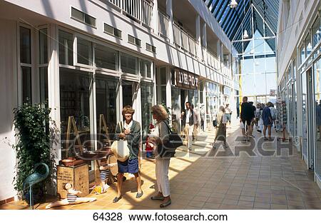 Stock Photo - Tourists in shopping mall, Heringsdorf, Seebruecke Island, Usedom, Mecklenburg-Vorpommern, Germany . Fotosearch