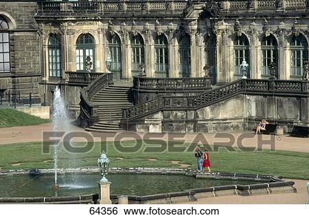 Stock Photograph - Tourists near fountain, Zwinger Castle, Dresden, Saxony, Germany . Fotosearch