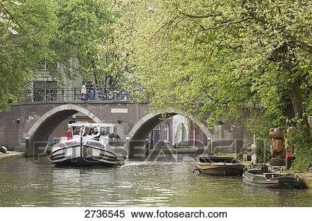 Tourists on boat in river, Alte Gracht, Utrecht, Netherlands View Large Photo Image Stock Photography - Tourists on boat in river, Alte Gracht, Utrecht, Netherlands . Fotosearch