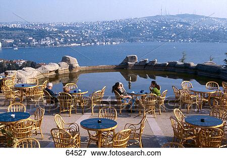 Tourists relaxing on a poolside, Ulus Park, Istanbul, Turkey View Large Photo Image Stock Photo - Tourists relaxing on a poolside, Ulus Park, Istanbul, Turkey . Fotosearch