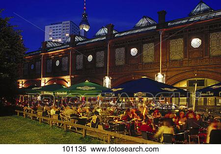 Tourists sitting at sidewalk cafe, Berlin, Germany View Large Photo Image Stock Photography - Tourists sitting at sidewalk cafe, Berlin, Germany . Fotosearch