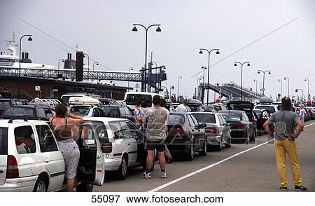 Tourists waiting at port, Travemuende, Germany View Large Photo Image Stock Photo - Tourists waiting at port, Travemuende, Germany . Fotosearch
