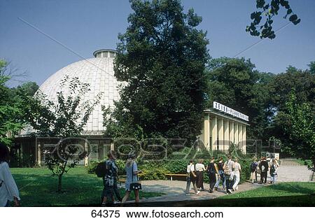 Tourists walking towards planetarium, Zeiss planetarium, Jena, Thuringia, Germany View Large Photo Image Stock Photography - Tourists walking towards planetarium, Zeiss planetarium, Jena, Thuringia, Germany . Fotosearch