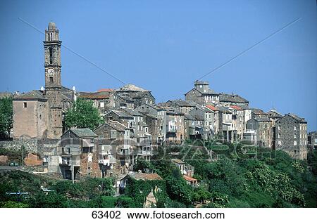 Town on hill against blue sky, Venzolasca, Corsica, France View Large Photo Image Stock Image - Town on hill against blue sky, Venzolasca, Corsica, France . Fotosearch