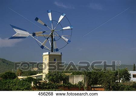 Traditional windmill against sky, Balearic Islands, Spain View Large Photo Image Stock Photo - Traditional windmill against sky, Balearic Islands, Spain . Fotosearch