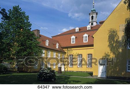 Trees near building, Herrnhut, Goerlitz, Saxony, Germany View Large Photo Image Stock Photo - Trees near building, Herrnhut, Goerlitz, Saxony, Germany . Fotosearch