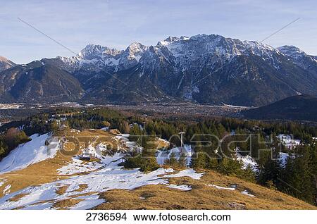 Trees on snow covered landscape, Karwendel, Wetterstein, Germany View Large Photo Image Picture - Trees on snow covered landscape, Karwendel, Wetterstein, Germany . Fotosearch