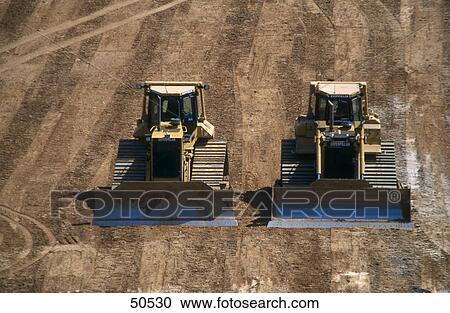 Two excavators at opencast mine, Garzweiler, Germany View Large Photo Image Stock Image - Two excavators at opencast mine, Garzweiler, Germany . Fotosearch