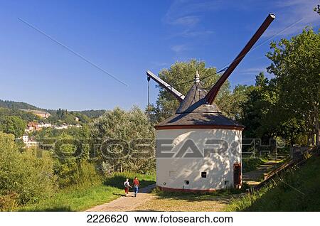 Stock Image - Two people near revolving crane, Moselkern, Germany . Fotosearch