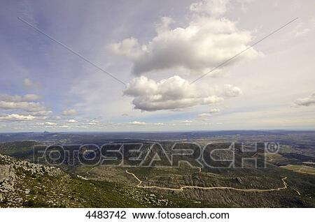 View from Mount St. Baudille to Pic Saint Loup, Languedoc-Roussillon, France, Europe View Large Photo Image Stock Image - View from Mount St. Baudille to Pic Saint Loup, Languedoc-Roussillon, France, Europe . Fotosearch