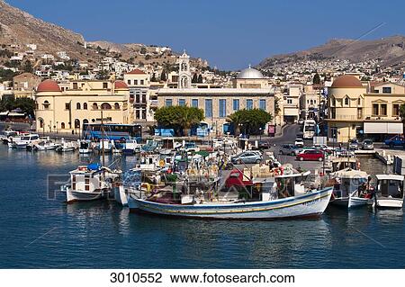 View from the water to seaport and city, Kalymnos, Greece View Large Photo Image Stock Image - View from the water to seaport and city, Kalymnos, Greece . Fotosearch