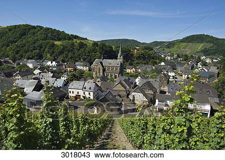 View from vineyard to Dhron with church, Rhineland-Palatinate, Germany View Large Photo Image Stock Image - View from vineyard to Dhron with church, Rhineland-Palatinate, Germany . Fotosearch