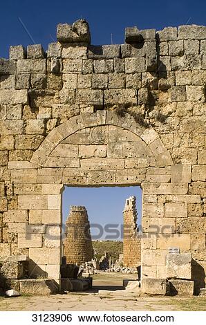 View through a gate at the ruins of Perge, Turkey View Large Photo Image Stock Photograph - View through a gate at the ruins of Perge, Turkey . Fotosearch
