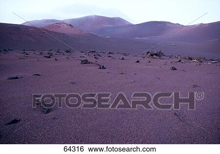 Volcanic landscape at dusk, Timanfaya, Lanzarote, Canary Islands, Spain View Large Photo Image Stock Photograph - Volcanic landscape at dusk, Timanfaya, Lanzarote, Canary Islands, Spain . Fotosearch