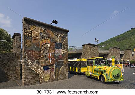 Stock Image - Wall picture on pillar of the Moselle bridge at Cochem and train dummy, Rhineland-Palatinate, Germany . Fotosearch