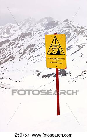 Warning sign on snow covered landscape, Tyrol, Austria View Large Photo Image Stock Photo - Warning sign on snow covered landscape, Tyrol, Austria . Fotosearch