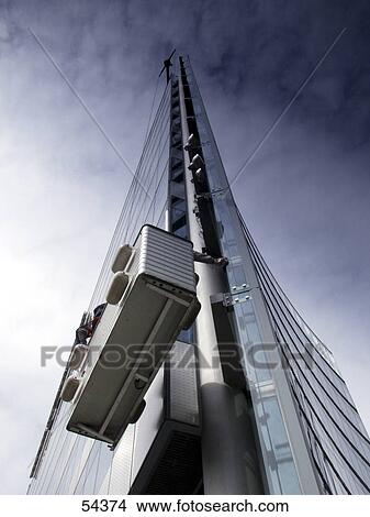 Window cleaning of office building View Large Photo Image Picture - Window cleaning of office building . Fotosearch