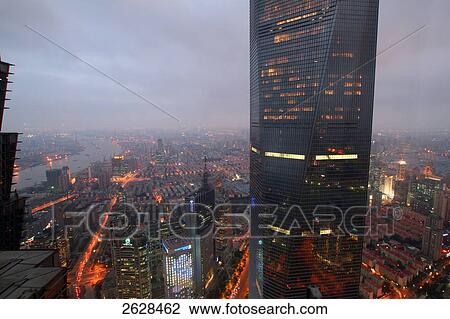 Aerial view of cityscape lit up at night, Shanghai World Financial Center, Huangpu River, Pudong, Shanghai, China View Large Photo Image Stock Image - Aerial view of cityscape lit up at night, Shanghai World Financial Center, Huangpu River, Pudong, Shanghai, China . Fotosearch