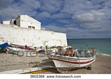 Stock Photo - At the harbor of Burgau, Algarve, Portugal . Fotosearch
