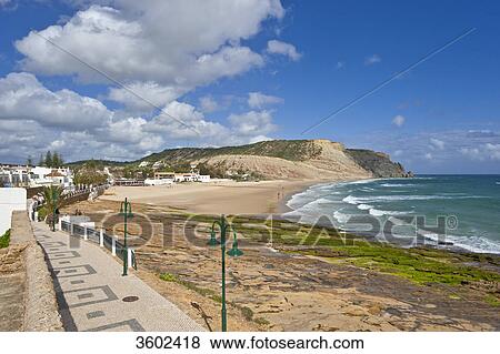 Beach and promenade in Praia da Luz, Algarve, Portugal View Large Photo Image Stock Photo - Beach and promenade in Praia da Luz, Algarve, Portugal . Fotosearch