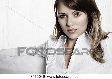 Blond woman looking at camera, portrait View Large Photo Image Stock Photo - Blond woman looking at camera, portrait . Fotosearch