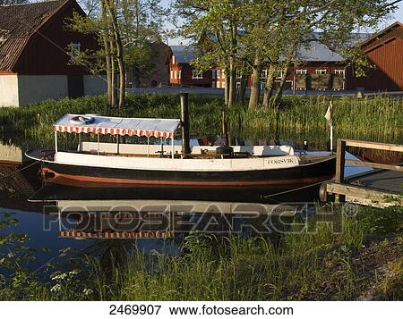 Boat moored at jetty, Forsvik, Vastra Gotaland County, Sweden View Large Photo Image Stock Photo - Boat moored at jetty, Forsvik, Vastra Gotaland County, Sweden . Fotosearch