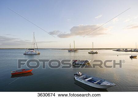 Boats near harbor, Olhao, Algarve, Portugal View Large Photo Image Picture - Boats near harbor, Olhao, Algarve, Portugal . Fotosearch