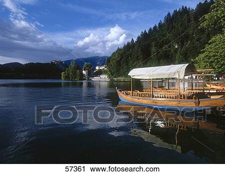 Boats on the lakeside, Bled Lake, Slovenia View Large Photo Image Stock Image - Boats on the lakeside, Bled Lake, Slovenia . Fotosearch