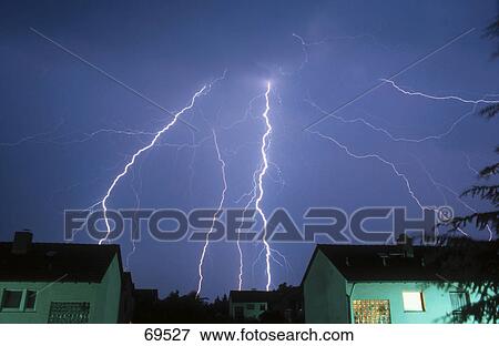 Bolt of lightning over city, Germany View Large Photo Image Stock Photo - Bolt of lightning over city, Germany . Fotosearch