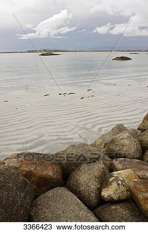 Boulders at the coast of Arranmore Island, Ireland View Large Photo Image Stock Image - Boulders at the coast of Arranmore Island, Ireland . Fotosearch